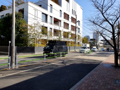 Gaisensha in Hiroo on National Foundation Day, followed by 2 police cars