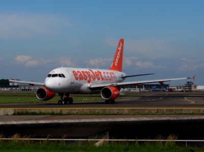 G-EZDW Airbus A319-111 easyJet taxiing at Schiphol (AMS - EHAM), The Netherlands, 18may2014, pic-1 photo