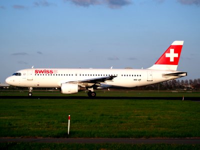 HB-IJP Swiss Airbus A320-214 - cn 681 takeoff from Polderbaan, Schiphol (AMS - EHAM) at sunset, pic2 photo