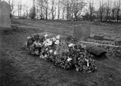 Grave with funeral flowers (1293815)