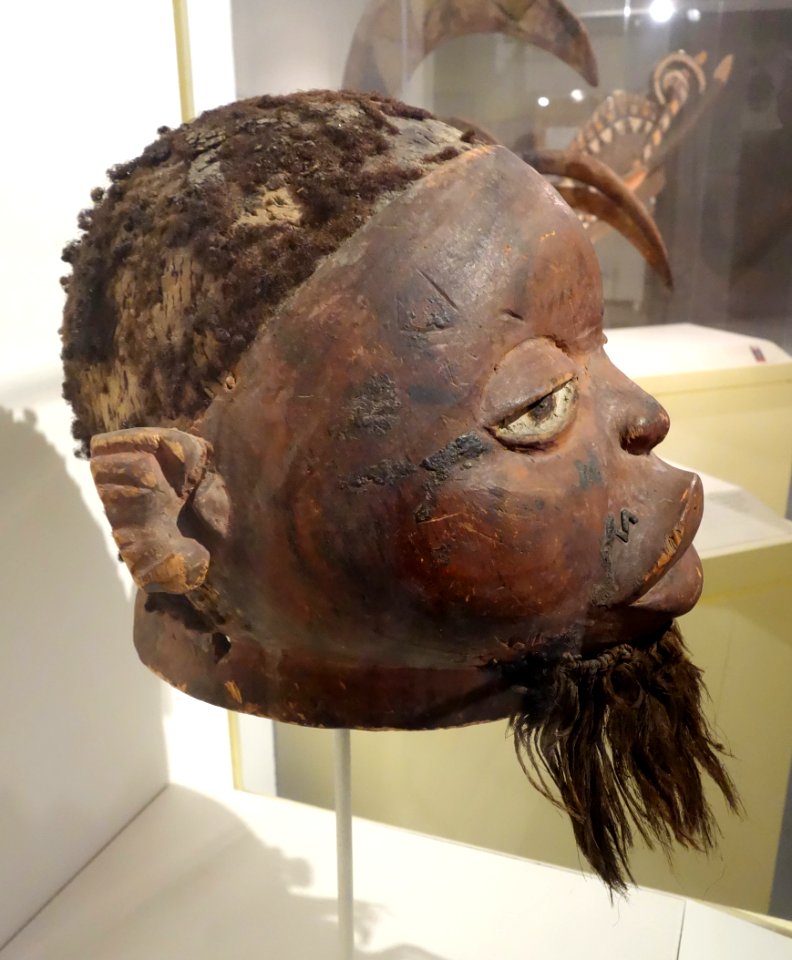 Lipiko Mask, view 1 - Makonde people, Cabo Delgado province, Mozambique, 19th century, wood, human hair, fiber, pigment - Brooklyn Museum - Brooklyn, NY - DSC08578