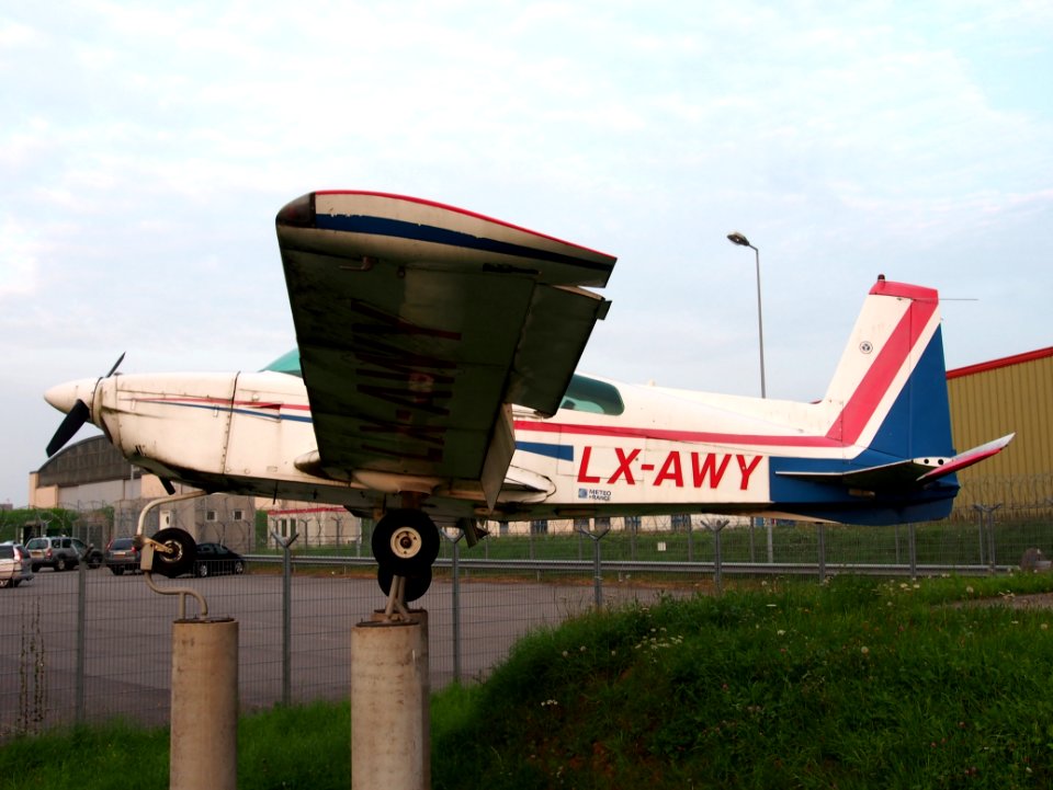 LX-AWY American Aviation AA-5 Traveler at Luxembourg airport as gatekeeper