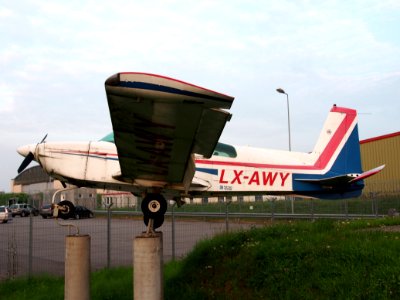 LX-AWY American Aviation AA-5 Traveler at Luxembourg airport as gatekeeper