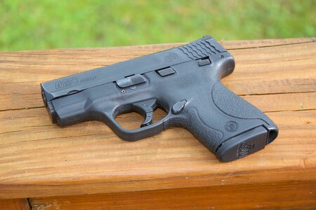 Wood pistol protection photo