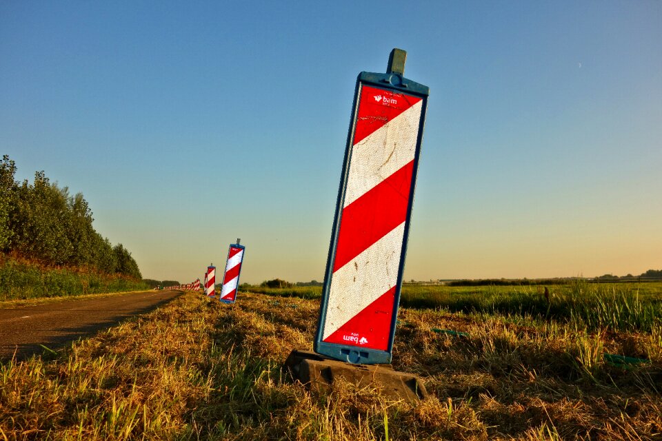 Red-white striped road works construction warning