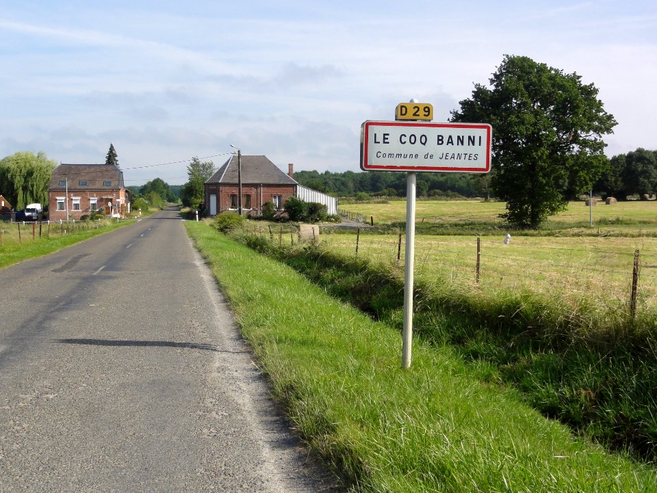 Jeantes (Aisne) city limit sign Le Coq Banni