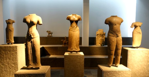 Divinities, left two from Binh Hoa, Tra Vinh, right from An Minh, Soc Trang, mid 11th century AD, sandstone - Museum of Vietnamese History - Ho Chi Minh City - DSC06015