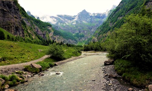 Mountain body of water landscape photo