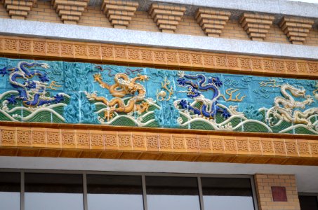 Dragons detail above entrance to Mandarin Building from China town bridge, Winnipeg, Manitoba photo