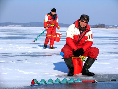 Fishing overalls ice auger photo