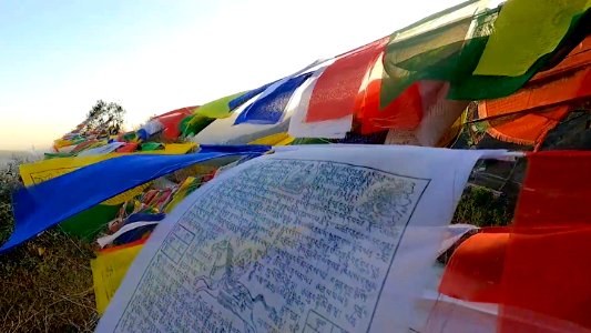 Colorful Buddhist flag on Kipling Trail Uttarakhand India