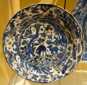 Dish copying a Chinese landscape with deer, black seal-mark on base, Iran, Isfahan, early 17th century, underglaze-painted stonepaste - Royal Ontario Museum - DSC04814