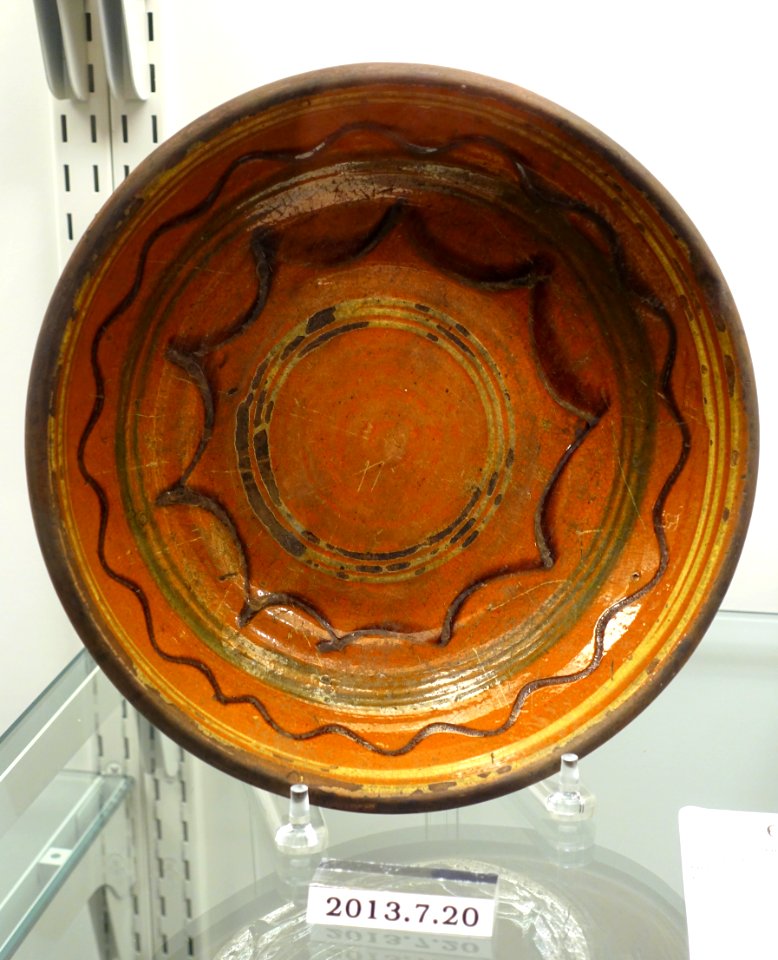 Dish, United States, probably Pennsylvania, 1820-1840, lead-glazed redware, white slip, copper green, item HD 2013.7.20 - Flynt Center of Early New England Life - Deerfield, Massachusetts - DSC04059