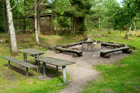 Fjällastugan grill area and wood shed