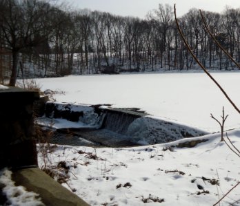 Echo Lake Park NJ dam with water and frozen lake