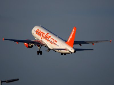 Easyjet Airbus 320 G-EZUH takeoff from Polderbaan, Schiphol (AMS - EHAM) at sunset, pic4 photo