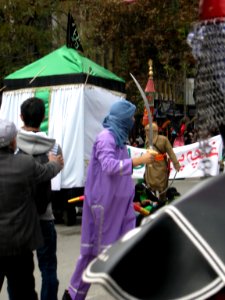 Dramatic (Shabih) - November 14,2013 - Muharram 10,1435 - Guide photographer back - Main Street of Nishapur 085