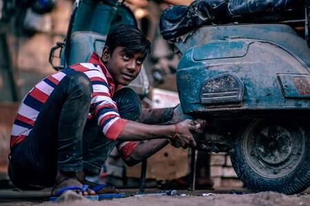 Man repair motorcycle