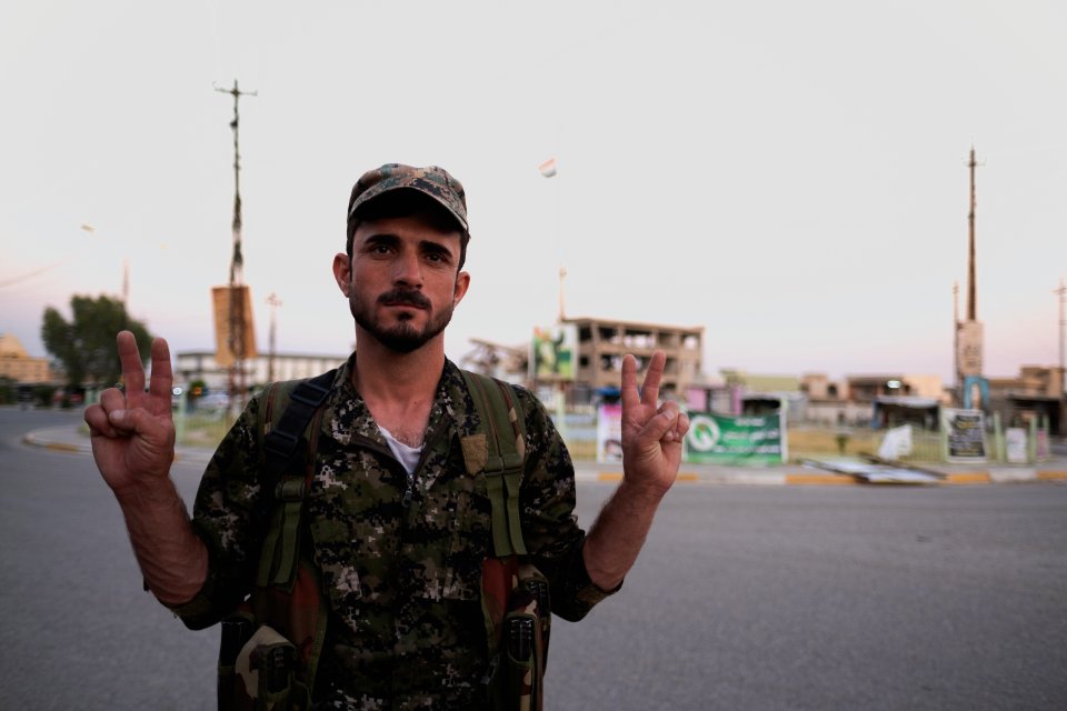 Portraits of a security officer from the Ezidi community in summer of 2019 in Shingal (Sinjar) 15