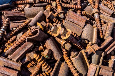 Rusty railroad screws photo