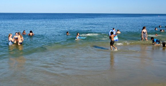 Sandy Hook beach NJ bathers in water photo