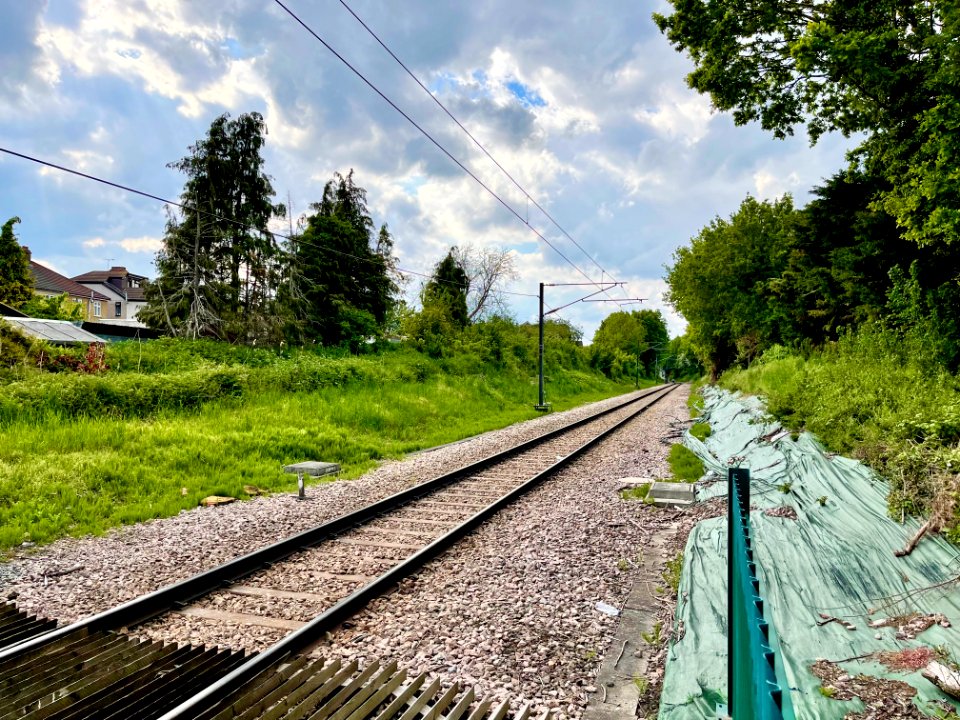 Romford to Upminster line from Butts Lane LC, towards Romford, 2021