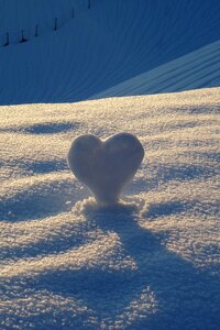Snow heart blue wintry photo
