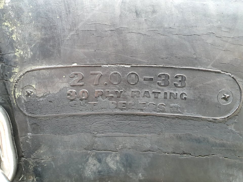 Marks on huge (around 2 meters diameter) Bridgestone tire 3