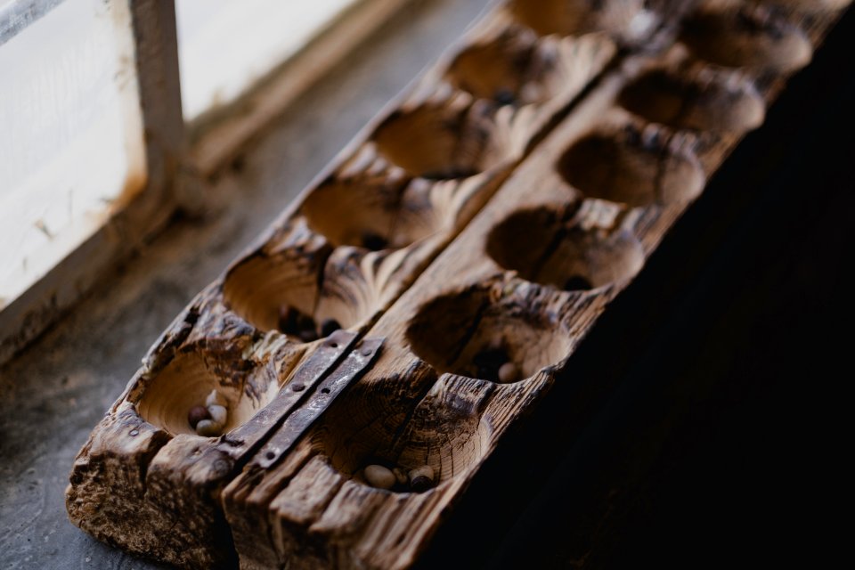 Mancala board at an Ezidi home in June of 2019 in Wardia village near Shingal town 01