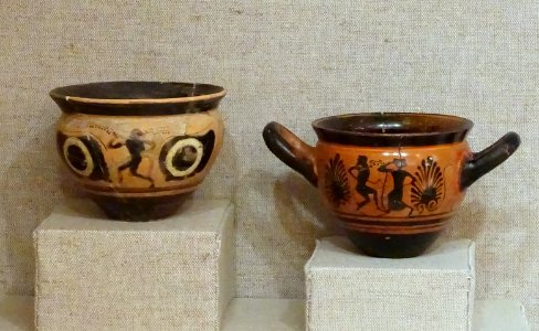 Mastoids, Attic black figure, left 500-475 BC, right Chiusa, Italy, 500-450 BC, both terracotta - Spurlock Museum, UIUC - DSC05890