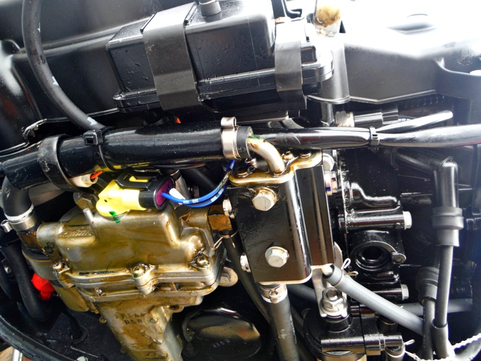 VST and fuel cooler of a Tohatsu MFS30B outboard motor