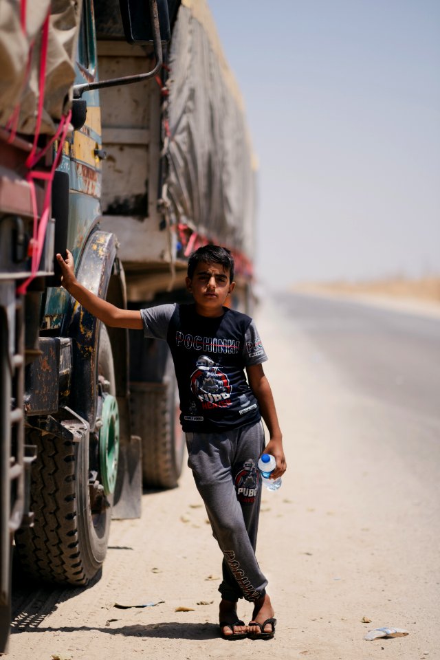 Views of interviews and meetings with Arab truck drivers in summer of 2019 waiting in Sinjar to deliver grain from Anbar and other Arab regions of Iraq 11