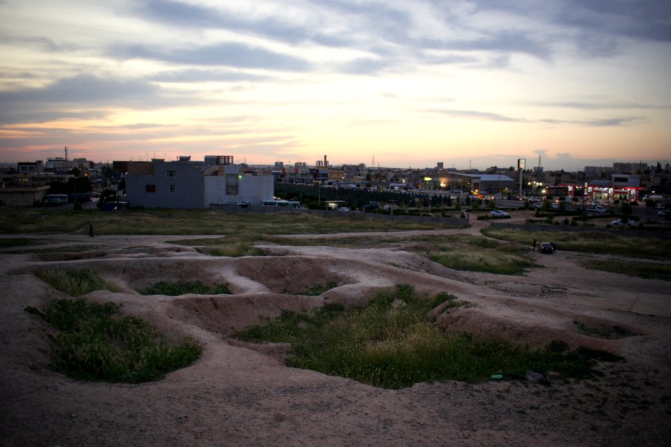 Views of pottery sherds, previous excavation sites, and the mound itself at 'Kelik Mishik' archaeological mound in Erbil 25