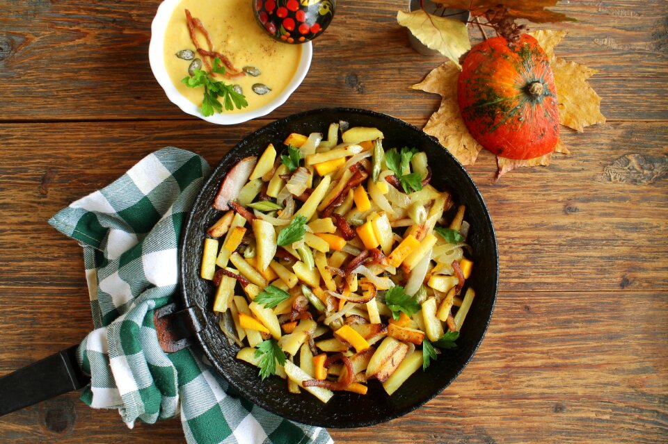 Fried potatoes potatoes with pumpkin the potatoes in the pan
