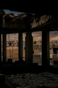 Views on 28th June 2019 around the destroyed city center of Shingal while a field fire rages south of the city 13