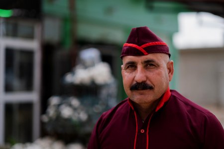 Views of the owner and his son of a recently reopened restaurant in Shingal, following war with the Islamic State 04