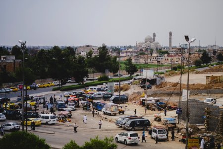Views of the ruins and markets at the mound where the Shrine of Nebi Yunis was built, in summer of 2019 after its destruction by the Islamic State 18