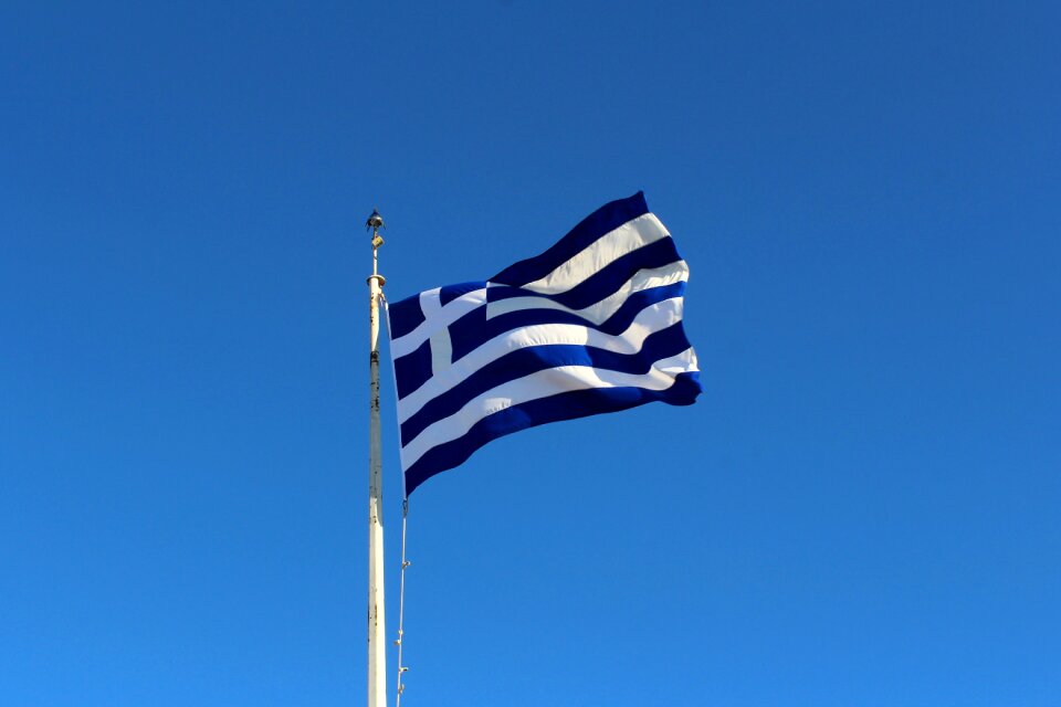 Greece the flag of greece the flag on the acropolis