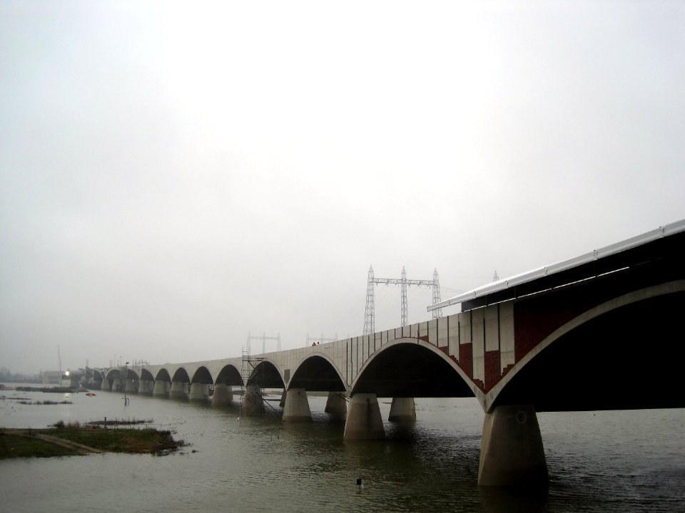 Waal river floodplains with 'De Oversteek' bridge construction, Lent, the Netherlands