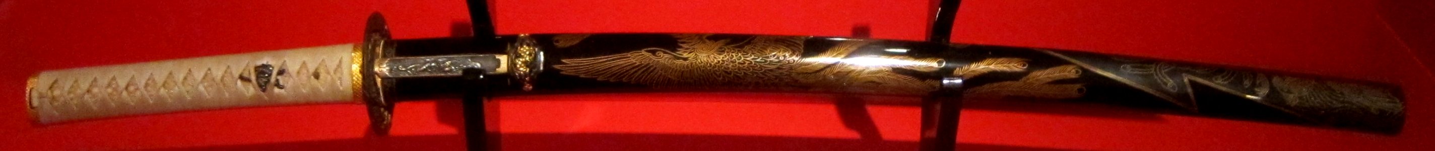 Wakizashi (short sword) mounting inlaid with phoenixes, Kamakura period