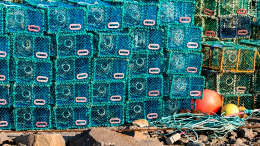 Stacks of lobster traps in Norra Grundsund 12 photo