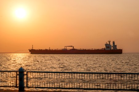 Sunrise on Vereda del Lago and Eagle Austin Ship in Maracaibo lake photo