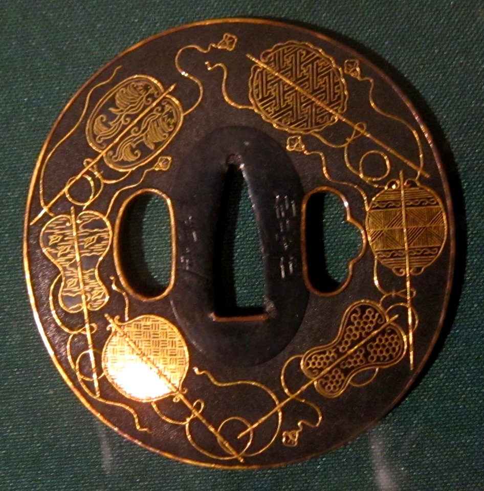 Sword guard (tsuba) with gold fans by Kusakari Kiyosada I