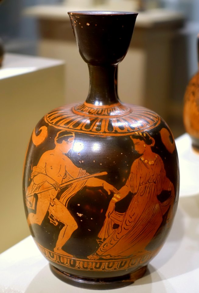 Squat lekythos with pursuit scene, Apulian, Late Classical period, 404-323 BC, terracotta with added yellow - Middlebury College Museum of Art - Middlebury, VT - DSC08037