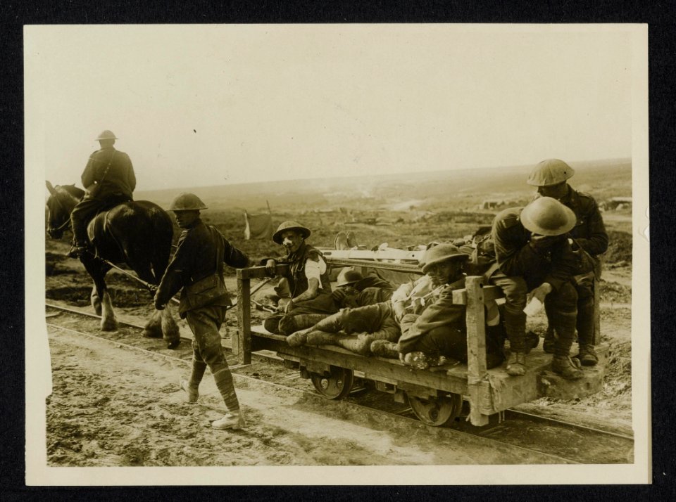 Some Canadian wounded being taken to the dressing station on a light railway fro, Bestanddeelnr 158-1110