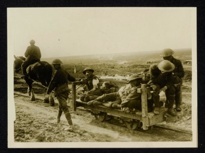 Some Canadian wounded being taken to the dressing station on a light railway fro, Bestanddeelnr 158-1110