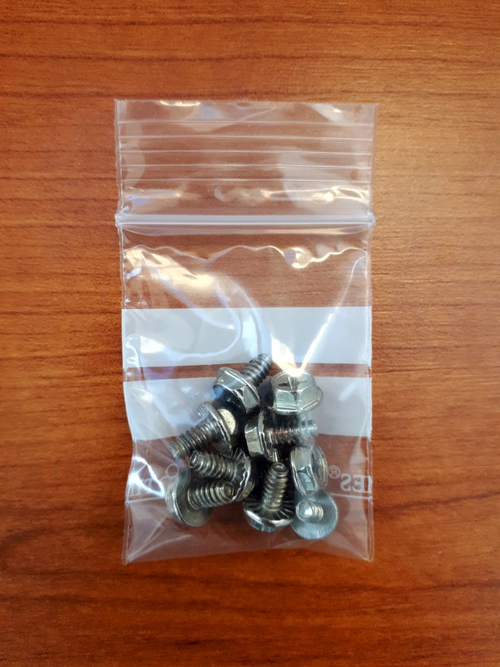 Transparent zipper storage bag - 35 x 45 mm - with screws