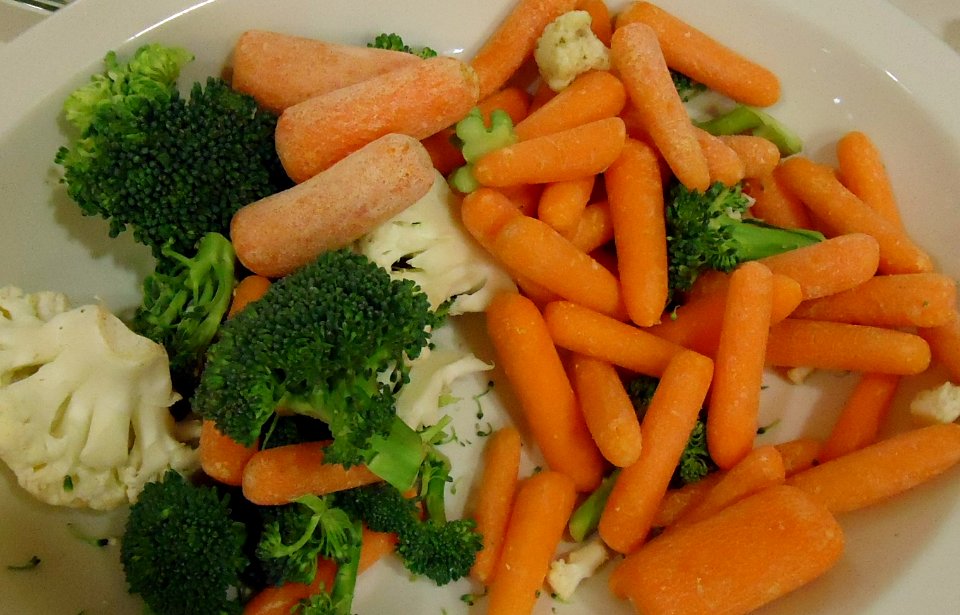 Vegetable platter including carrots broccoli cauliflower