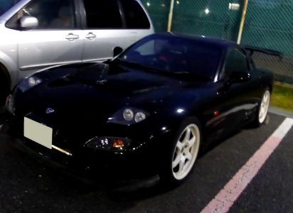 The frontview of tuned εfini RX-7 (FD3S) at night