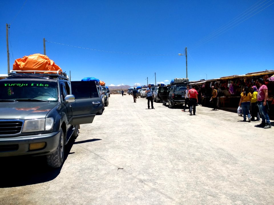 Tourists and tour vehicles in Colchani